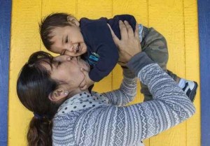 Sandra Dimas with her son Joseph, 8 months, at the Pomona Economic Opportunity Center, a safe place for day laborers and employers to come together. Dimas is from Michoacan, Mexico and is not a U.S. citizen but her baby is. She says of a Trump presidency, “This country is not supposed to be racist. What’s wrong with wanting to come here and make a better life for your kids and yourself?” (Photo by Mindy Schauer, Orange County Register/SCNG) 